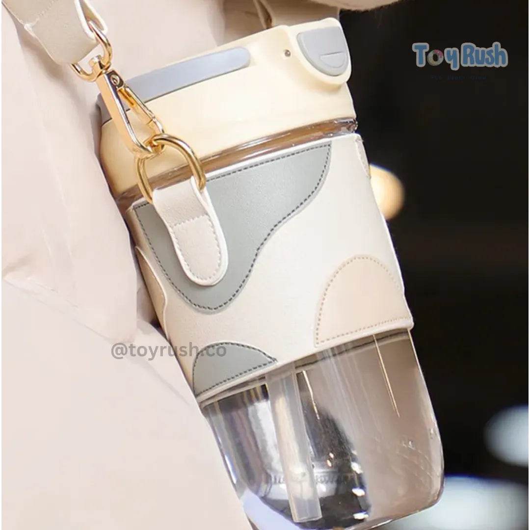 Classy Sipper Bottle with Faux Leather Sleeves, Straw and Strap - Toy Rush