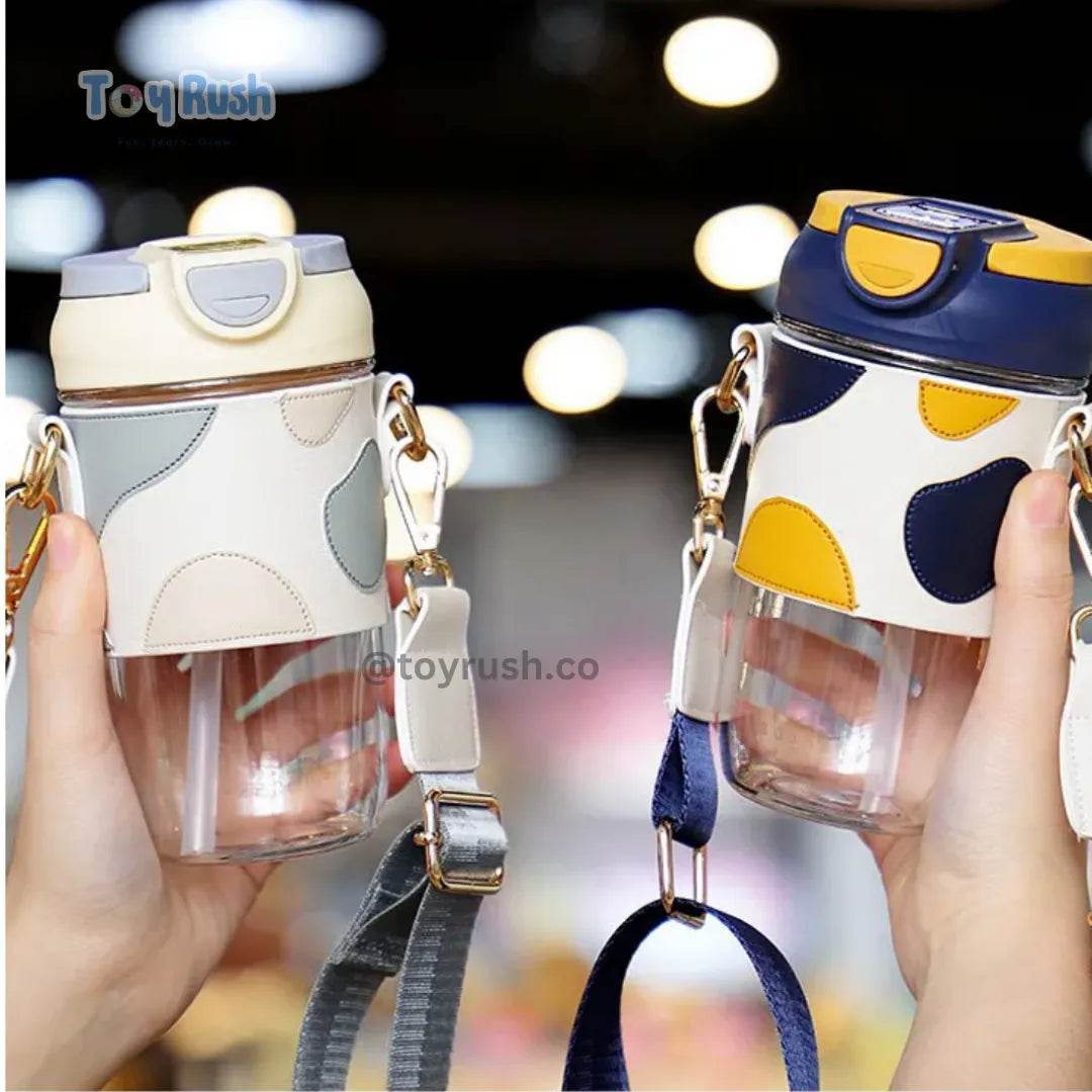 Classy Sipper Bottle with Faux Leather Sleeves, Straw and Strap - Toy Rush