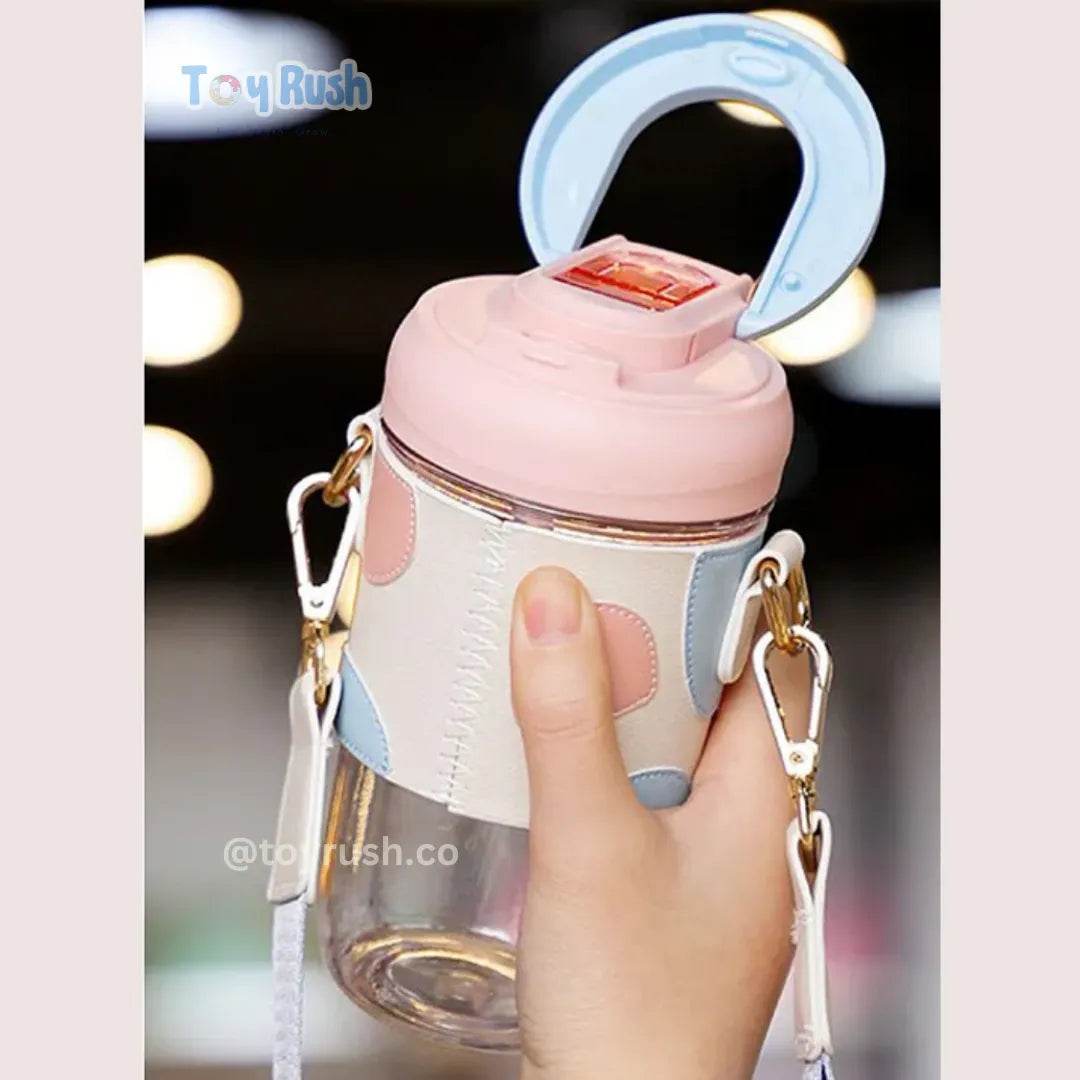 Classy Sipper Bottle with Faux Leather Sleeves, Straw and Strap - Toy Rush