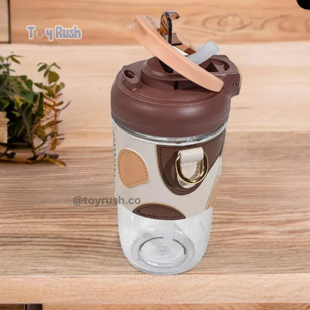Classy Sipper Bottle with Faux Leather Sleeves, Straw and Strap - Toy Rush