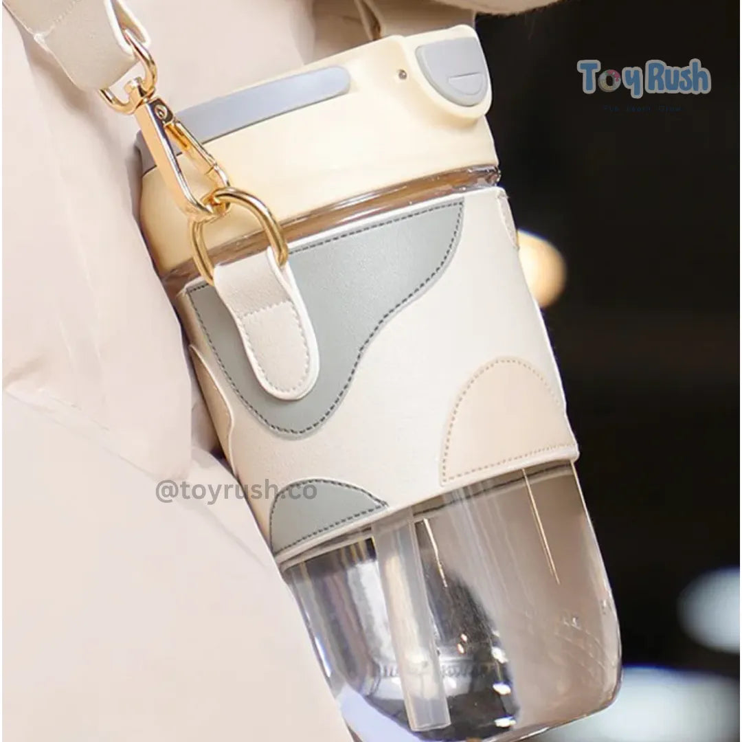 Classy Sipper Bottle with Faux Leather Sleeves, Straw and Strap