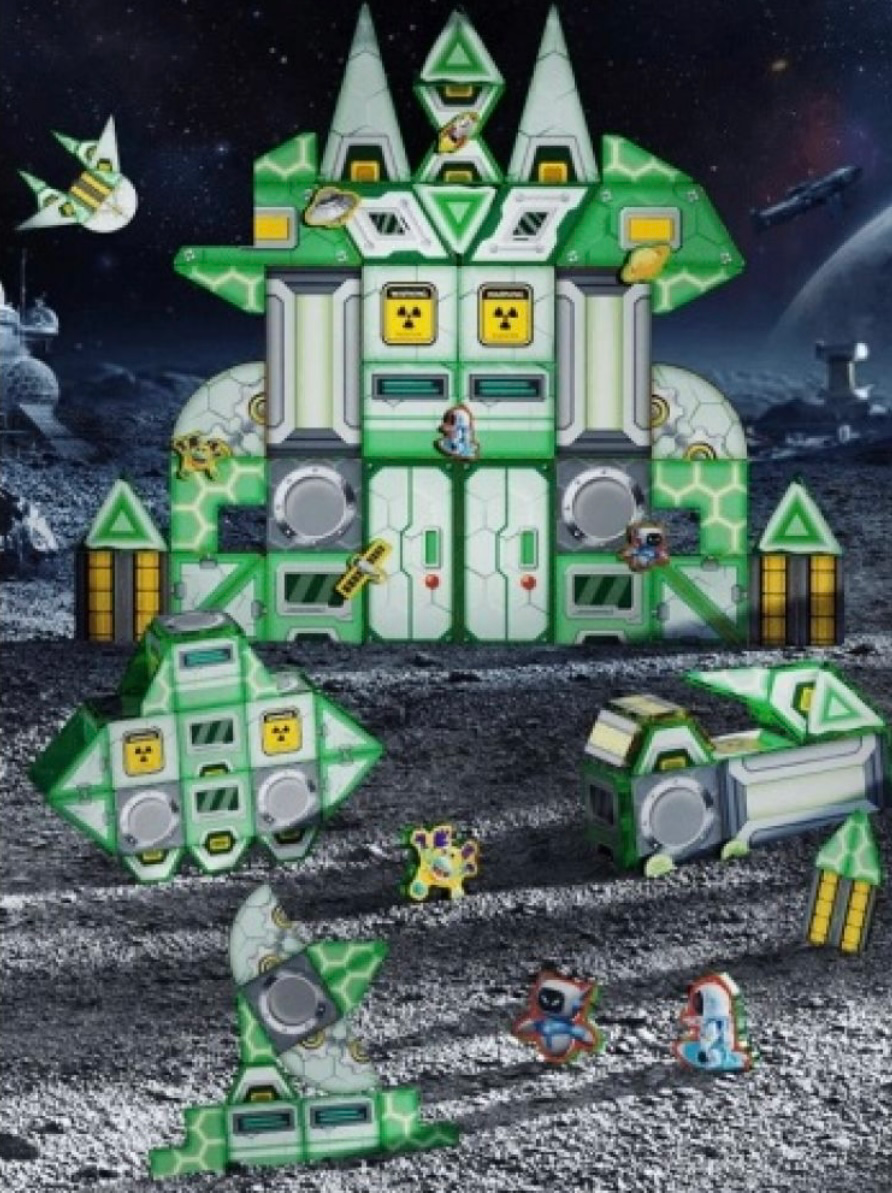 Toy space station set on a moon-like surface with small figures and vehicles.